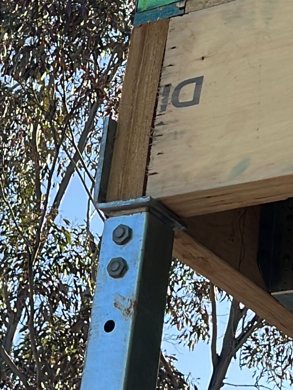 Beam sitting on a steel post with too little bearing, sent to the engineer, found during a frame inspection in Grantham Farm