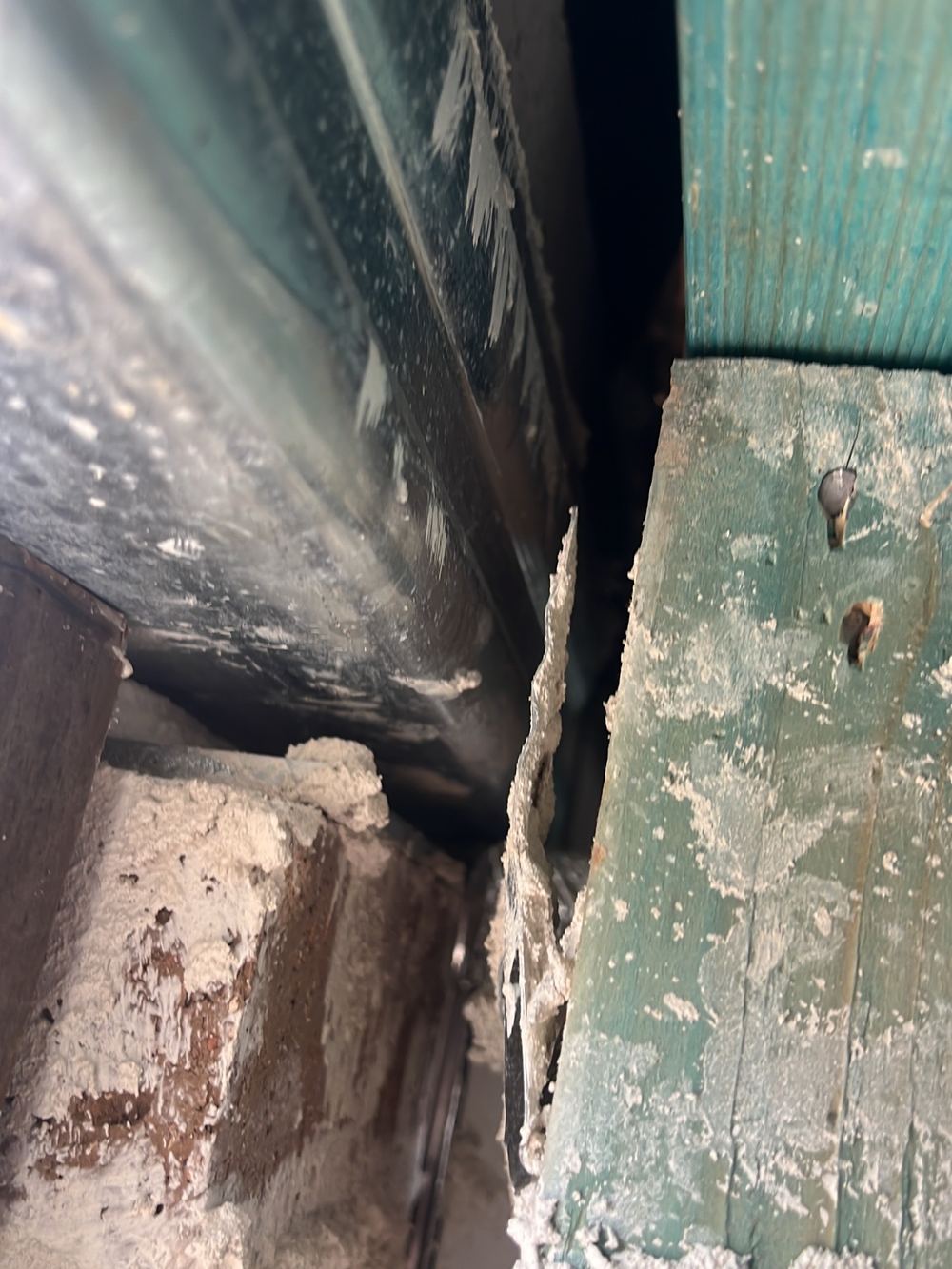 Laundry door lintel short of bearing onto the brickwork at each end, found during a lock-up inspection in Kellyville