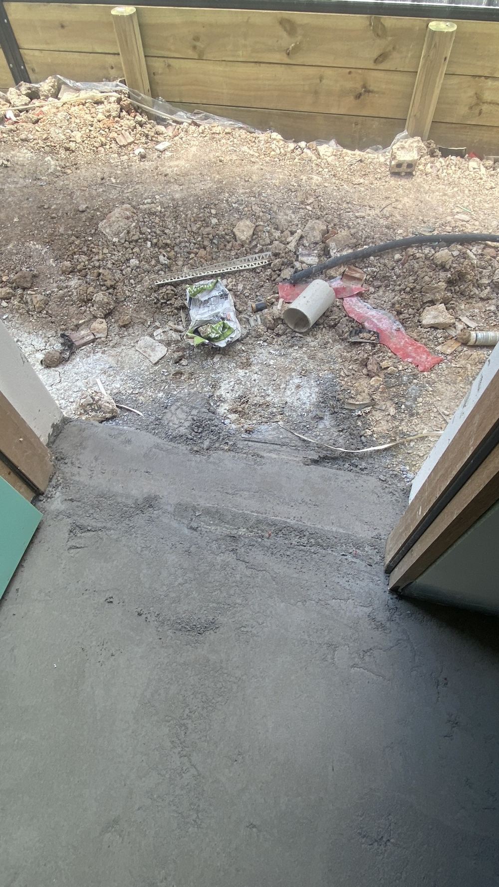 No waterstop angle across the laundry doorway to hold water in the room, found during a defect investigation in Tallawong