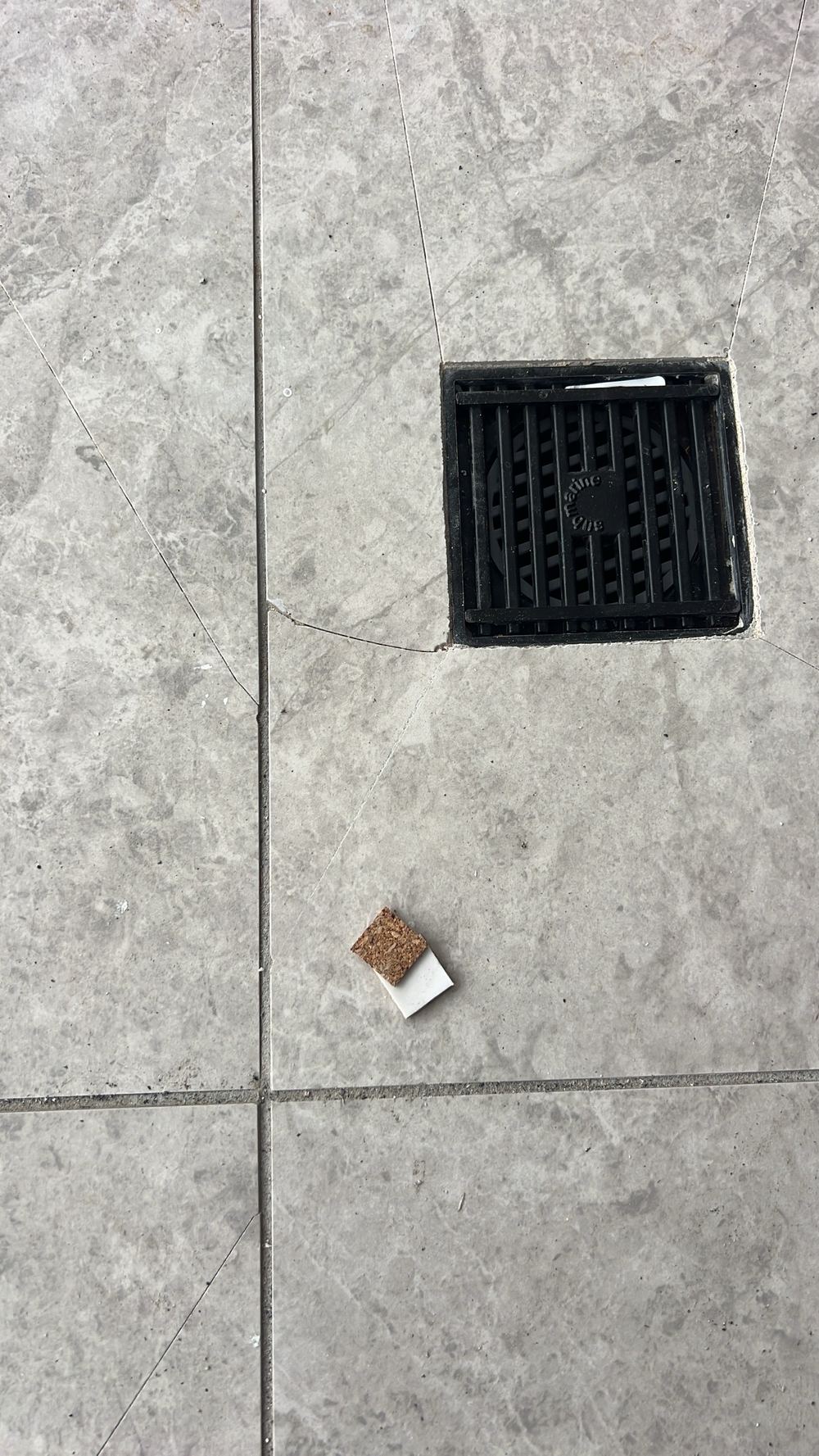 Cracked and chipped tiles that need replacing before handover, found during a handover inspection in Tallawong